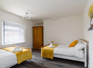 Clarence Heights yellow bedroom